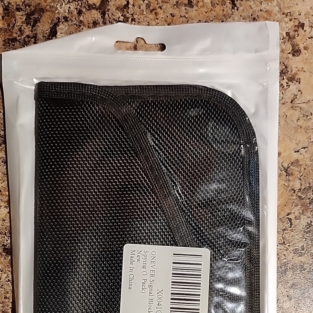 Sleek Mesh Anti-piracy Faraday Bag.